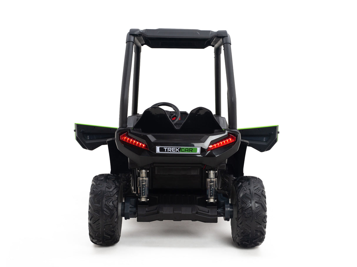 A green 2-seat kids ride-on golf buggy with durable rubber wheels and red LED lights is shown from the rear, featuring a steering wheel. The label TREKCAR is displayed, showcasing a sturdy frame suited for rough terrain.