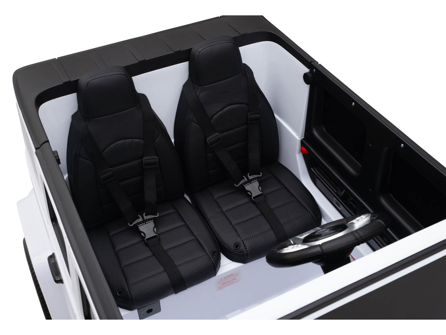 Top view of the 2 Seats 4x4 Mercedes-Benz G63 Kids Ride-On Car in white, showcasing its luxurious interior with two black seats, seat belts, and a steering wheel. Powered by a 24V battery for extended play, it features a sleek design inspired by Mercedes-AMG.