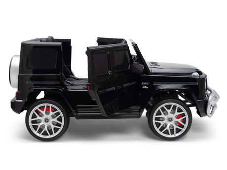 The Black 24V/4x4 Official Mercedes Benz G63 Ride On Car with RC showcases open doors, a visible interior, silver rims, red brake calipers, a front bumper guard, and a rear-mounted spare tire. This sleek ride-on SUV ensures endless fun for kids.