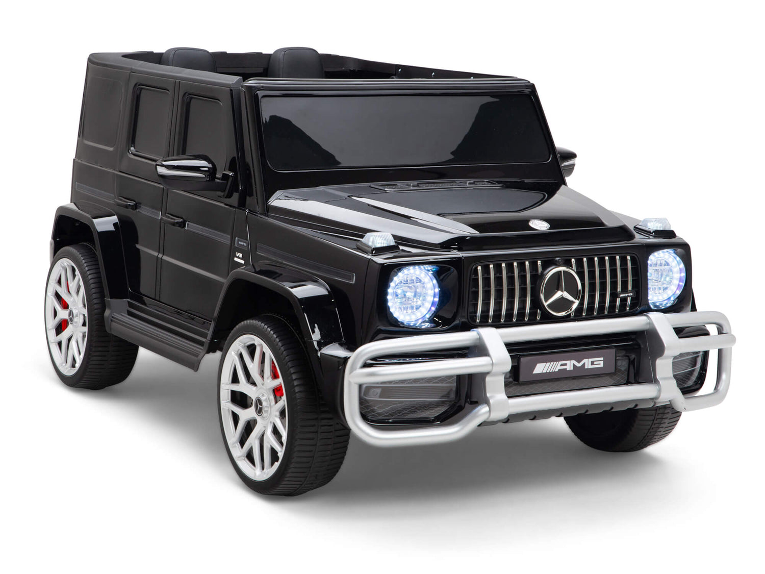 The Black 24V Mercedes-Benz G63 Ride-On Car for kids features a powerful battery, chrome accents, LED headlights, and a detailed grille. It sports four large white wheels with red brake calipers, enhancing its sporty allure.