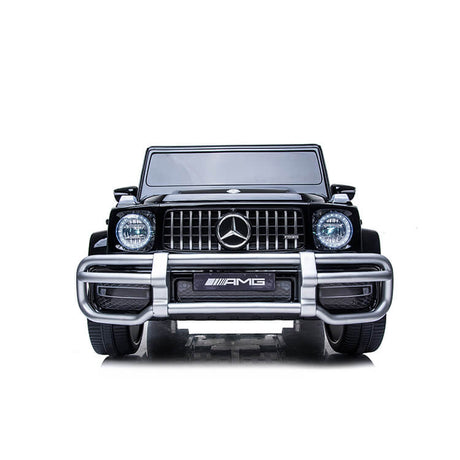 Front view of the Black 24V/4x4 Official Mercedes Benz G63 Ride On Car with RC, featuring a glossy finish, prominent grille, circular headlights, AMG branding, and detailed design elements for an authentic driving experience.