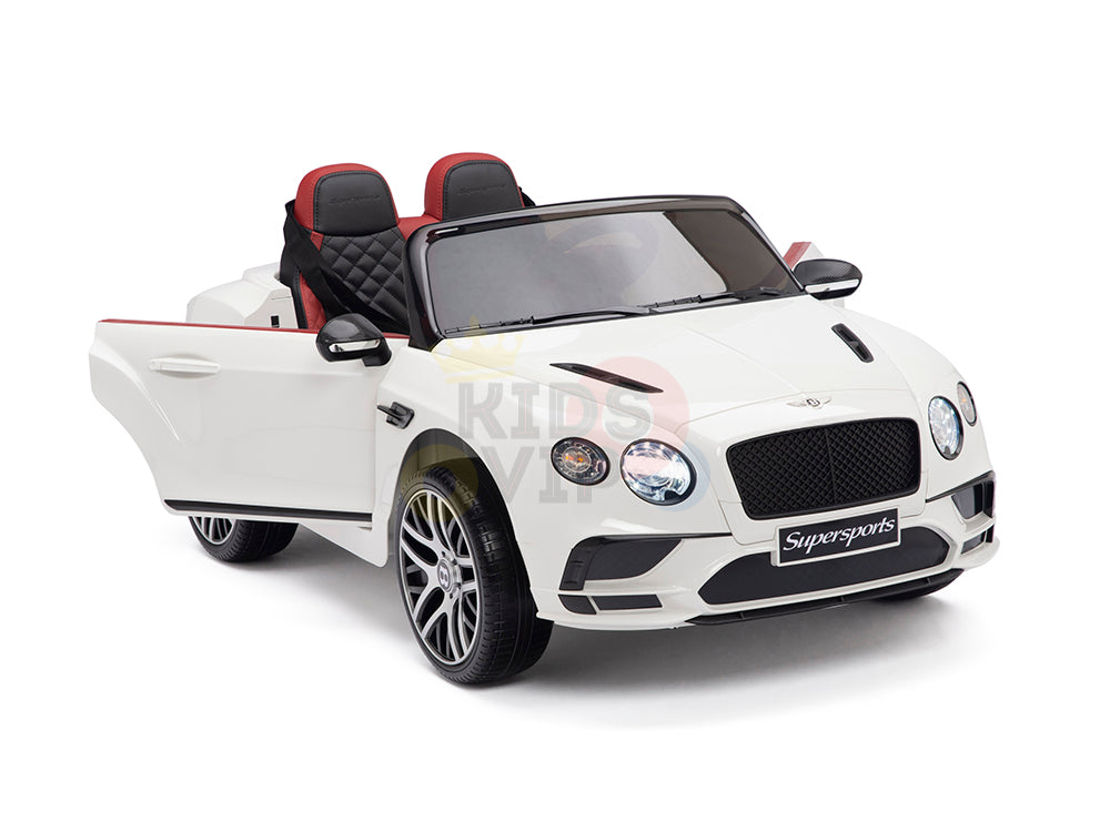 The White 12V Bentley GTC Kids Licensed Ride On Car, featuring rubber wheels and a remote, mimics a luxury sports car with opening doors, black and red quilted seats, detailed headlights, and Supersports front label for thrilling adventures.
