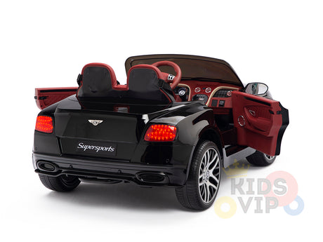 The Black 12V Bentley GTC Ride-On Car features a Supersports label, red interior, remote control, realistic steering wheel and dashboard, open doors, and a wing-like logo on the back. Perfect for thrilling adventures.