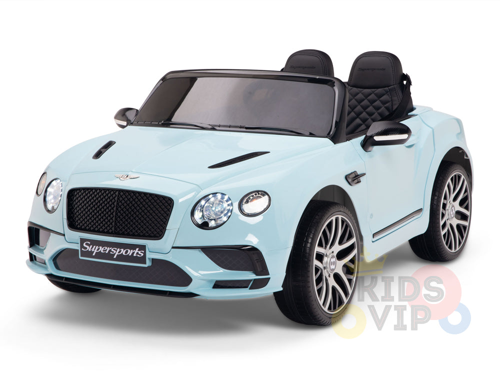 The Blue 12V Bentley GTC Kids Licensed Ride On Car, featuring rubber wheels and a remote control, boasts a Supersports grille label, detailed front bumper, and luxurious leather seats for an authentic luxury sports car experience.