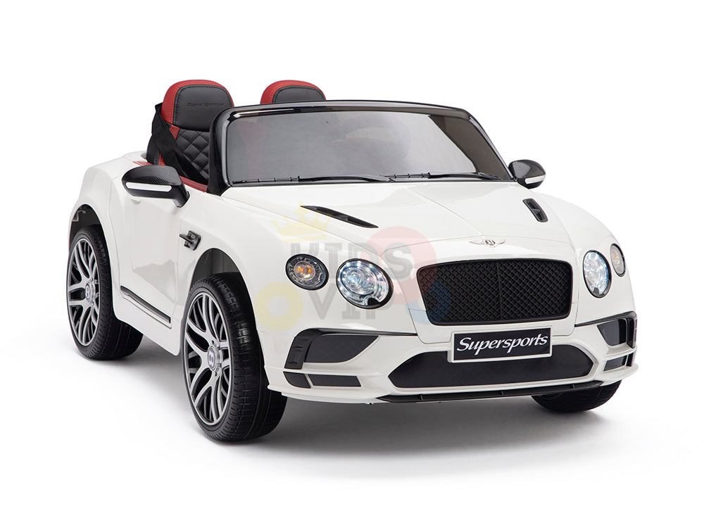 This stylish White 12V Bentley GTC Licensed Kids Ride-On Car features two leather seats, red and black interiors, detailed headlights, large rubber wheels, and a Supersports front grille. Its powered remotely for an exciting adventure.