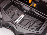 Close-up of a black plastic storage compartment in the Orange 2x24V/2WD Official Can-Am Maverick Ride on Buggy, LX Performance, with a textured surface and a label reading OH-C4001. A small ignition switch is on the left side, while an orange handle is partially visible at the top right.