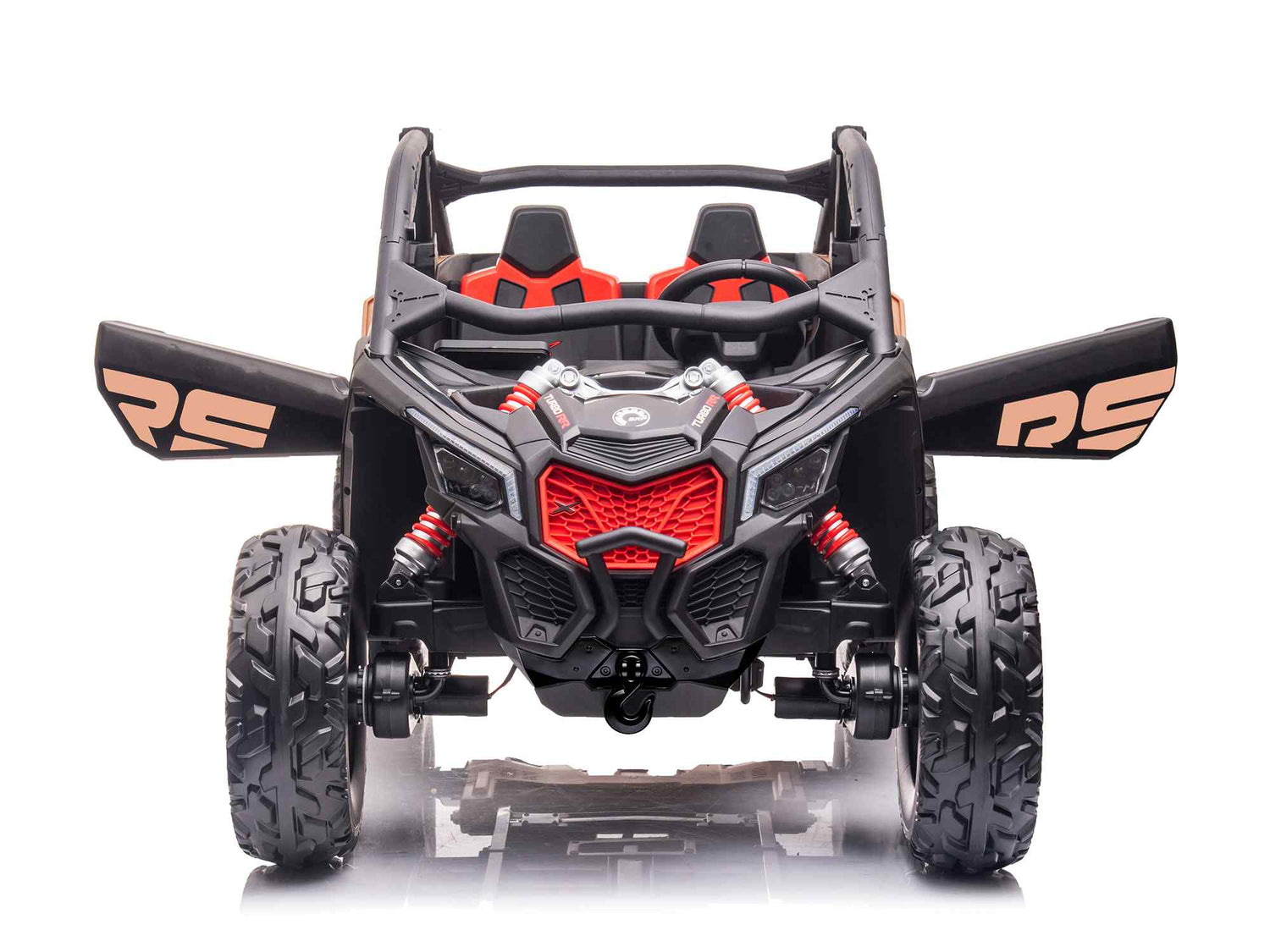 A Can-Am Maverick RS-inspired toy off-road vehicle with large tires, open-top design, and a 2-seater black body with red-accented seats and grille. RS logos feature on the sides, photographed from the front against a white background.