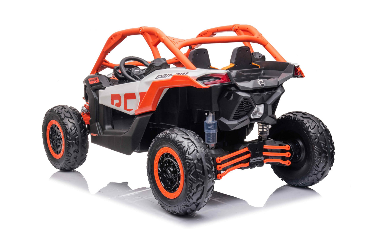 The Orange 2x24V/4WD Official Can-Am Maverick Ride on Buggy, LX Performance features a sleek black and white design, rugged tires, eco leather seats, and a roll cage. It is captured beautifully from the rear on a reflective white surface.