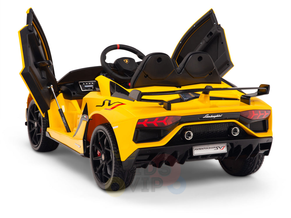 The rear view of the Yellow 12V Lamborghini SVJ Sport Kids Licensed 1 Seater Ride On Car highlights its open scissor doors, black seats, red taillights, steering wheel, and branding details.