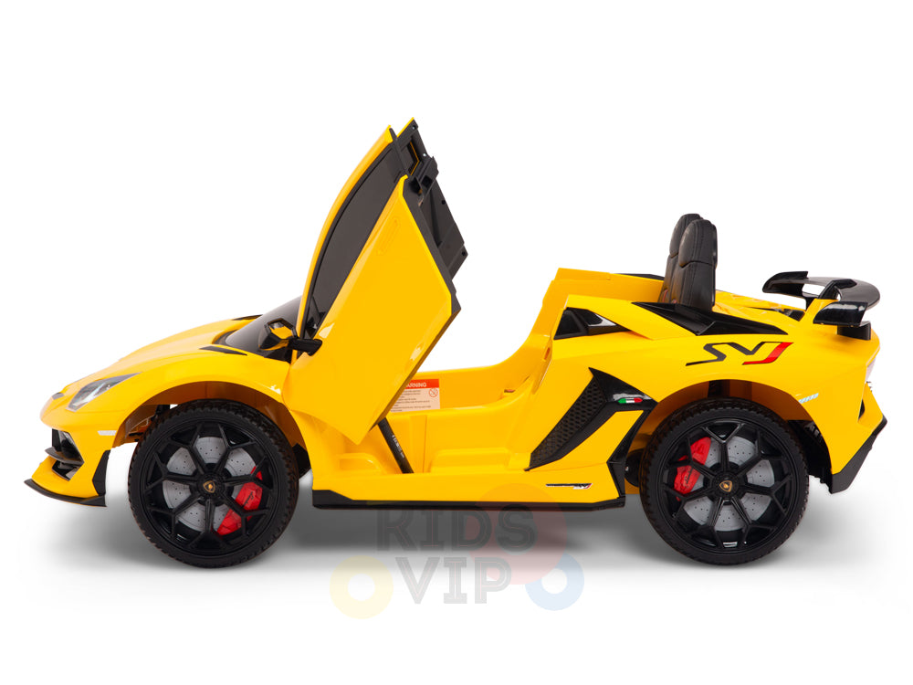 The Yellow 12V Lamborghini SVJ Sport Kids Licensed Ride-On Car features a single-seat design, upward-opening doors, black rubber wheels with red brake calipers, a rear spoiler, Kids VIP branding, and a detailed interior with a seat and dashboard for adventurous young drivers.