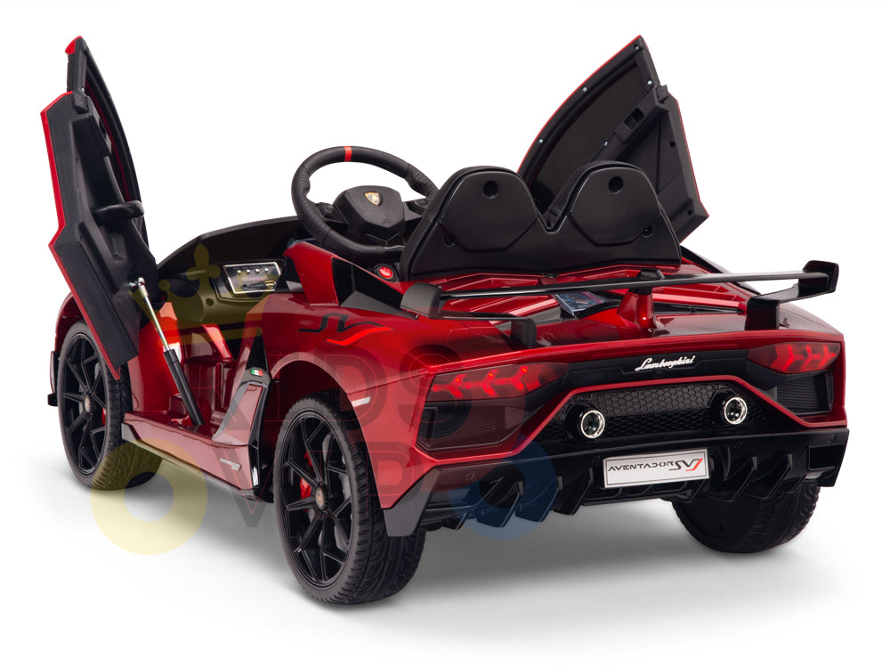 The Burgundy Red 12V Lamborghini SVJ Sport Kids Licensed Ride On Car evokes the real deal with its open scissor doors, steering wheel, sporty rear spoiler, and rubber wheels. Its a single-seater that lets kids steer their imagination toward thrilling adventures.