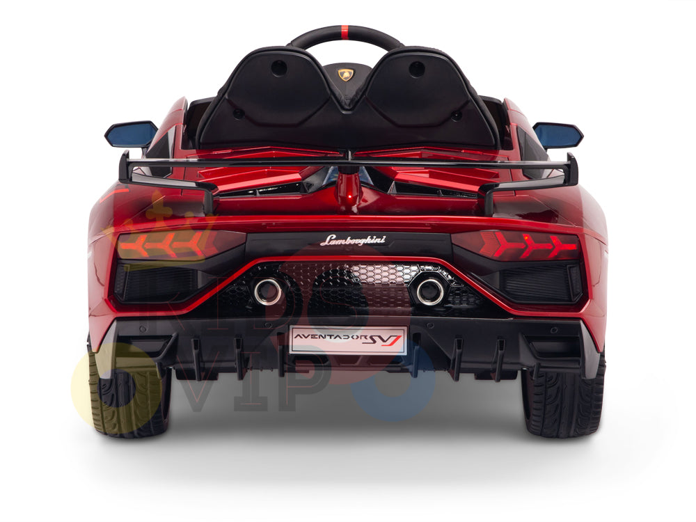 The Burgundy Red 12V Lamborghini SVJ Sport Kids Licensed 1 Seater Ride On Car features realistic tail lights, dual exhausts, a spoiler, and brand logo. Steering wheel and seats ensure an authentic driving experience for kids.