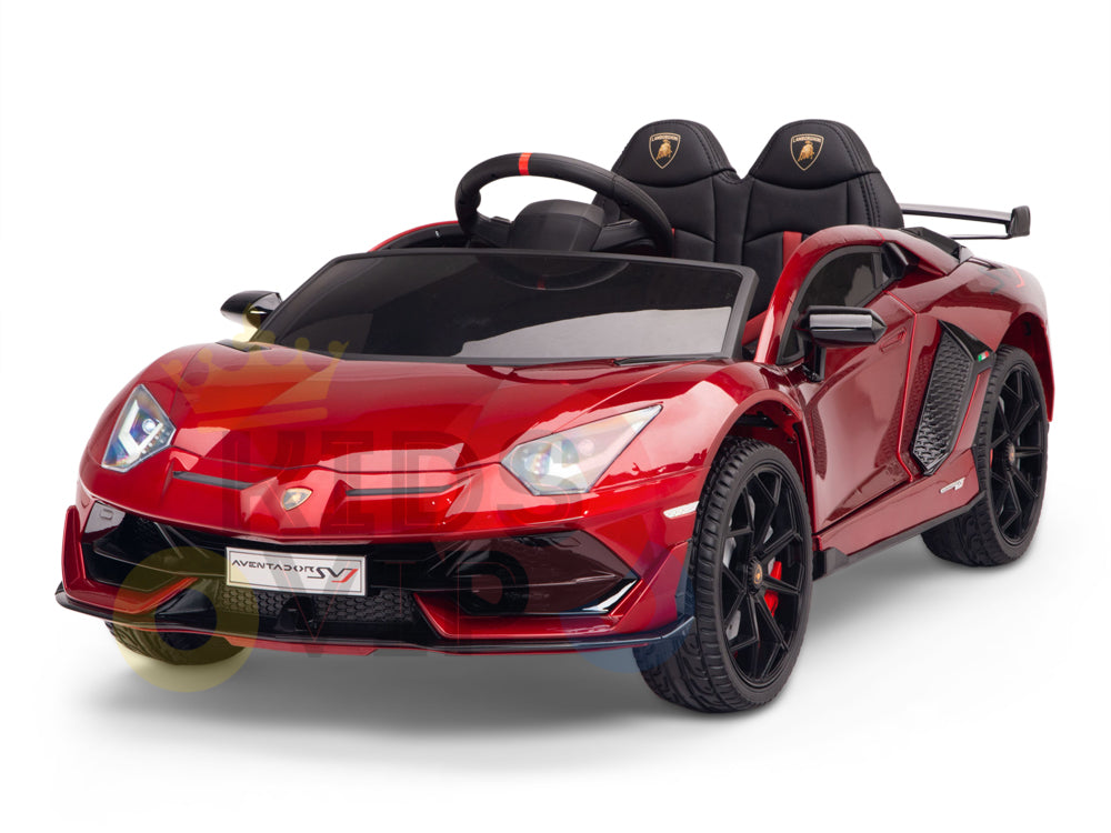 The Burgundy Red 12V Lamborghini SVJ Sport Kids Licensed Ride On Car features black seats, a steering wheel, and remote control. Sporting detailed headlights, sleek lines, logos on the front and seats, this 1-seater offers endless fun with its sporty design and rubber wheels.