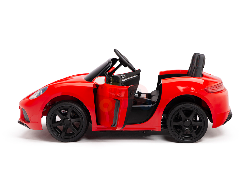 A side view of the Red 24V XXL SuperSport Big Kids Ride On Car with black wheels and an open drivers door. This sleek car, featuring a steering wheel and black seat, offers an exciting ride for children with its 180W brushless motor and real tires.
