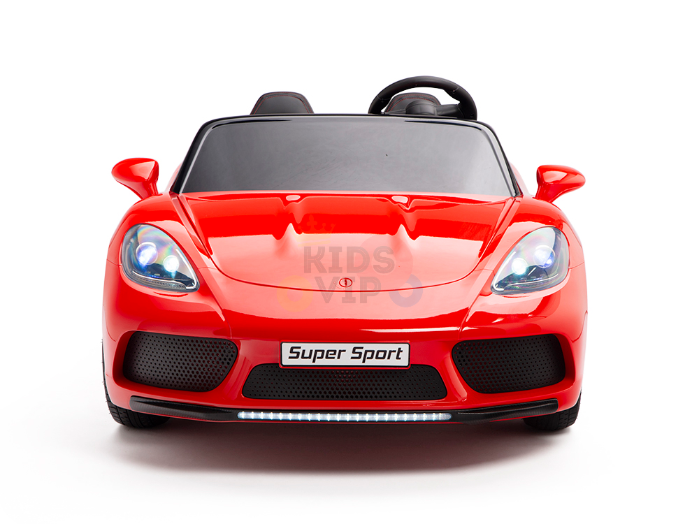 This Red 24V XXL SuperSport Ride On Car features a sleek aerodynamic design with front headlights, side mirrors, visible steering wheel, and real tires. Powered by a 180W brushless motor for smooth rides, it sports Super Sport on the license plate and Kids VIP on the windshield.