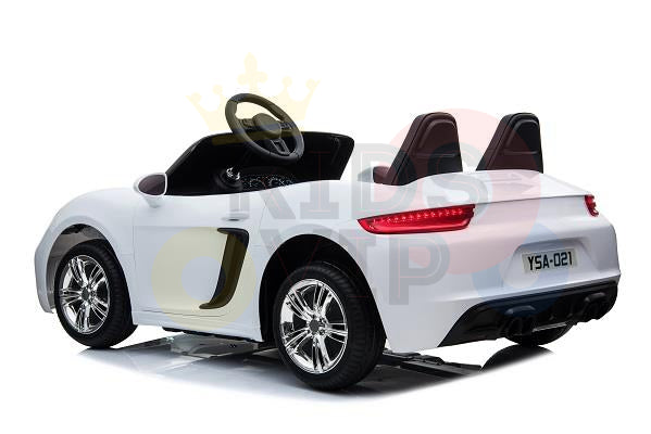 The White 24V XXL SuperSport Ride On Car, with a rear-view showing chrome wheels and a sleek black interior, features a steering wheel, real tires, two seats, and license plate YSA-021. Powered by a 180W brushless motor, its perfect for adventurous little drivers.