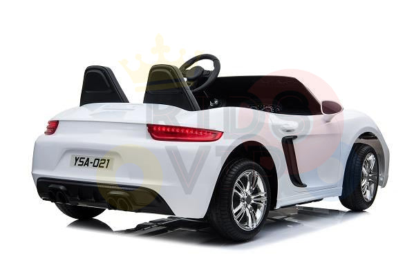 A white 24V XXL SuperSport Big Kids Ride On Car, featuring a sleek black interior and a license plate reading YSA-021, is seen from the rear angle. This sporty car boasts small wheels, a 180W brushless motor, and real tires.