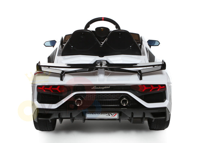 The rear of the White 12V Lamborghini SVJ Sport Kids Licensed Ride-On Car showcases detailed taillights, dual exhaust, and a sleek design. It features a small license plate area and visible steering wheel inside.