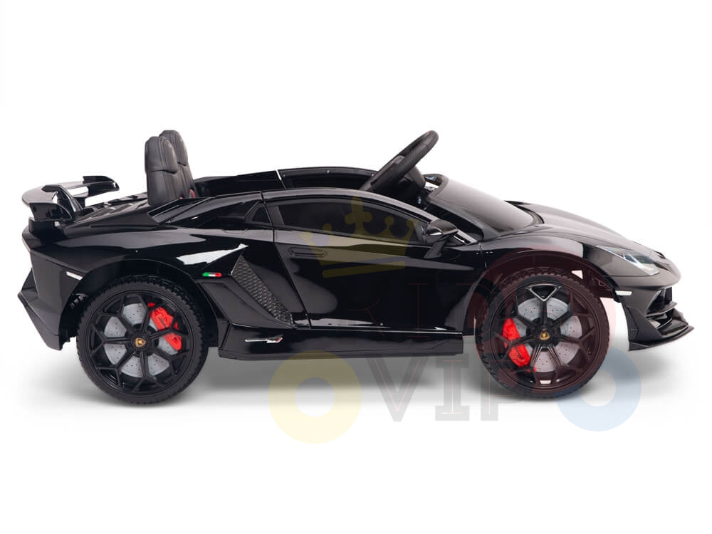 The Black 12V Lamborghini SVJ Sport Kids Ride-On Car features a sleek, black design with red brake calipers and a detailed interior. This licensed 1-seater includes a steering wheel and remote control functionality, set against a white background, ensuring fun and adventurous play.