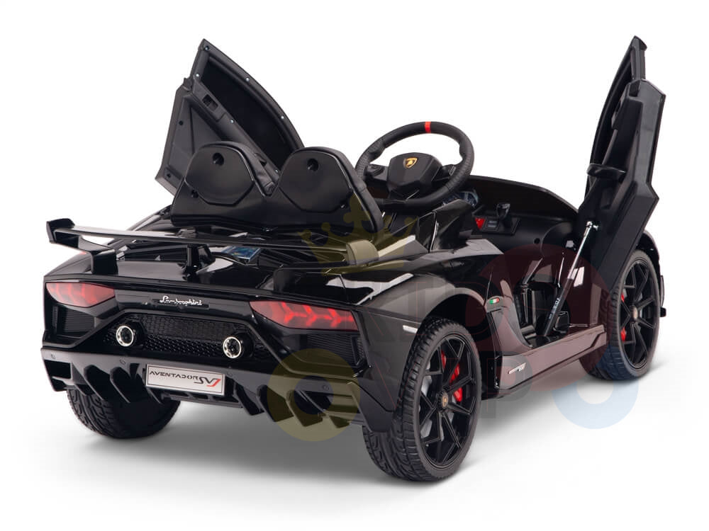The Black 12V Lamborghini SVJ Sport Kids Licensed Ride On Car features scissor doors, a single seat with a steering wheel, and SVJ on the license plate. Sleek design and rubber wheels make it perfect for young luxury enthusiasts.