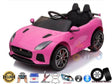 The Pink 12V Official Jaguar F-Type Complete Edition Kids Ride-On Car includes black leather seats, red-accented wheels, steering wheel, side mirrors, and realistic design. It features parental remote control, music capabilities, a 12V battery, and LED lights.