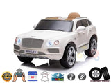 The White Licensed Bentley Bentayaga Complete Edition 12V Kids Ride On Car With Rc features a front grille, headlights, tan leather seats, parental remote control, music, EVA rubber wheels, and painting.