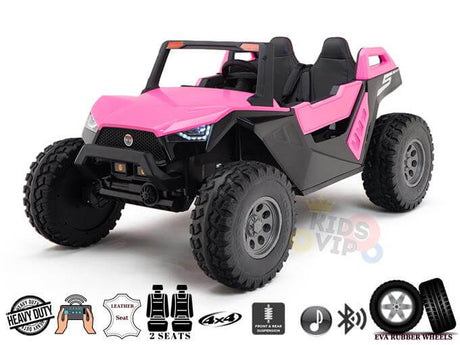 Pink 24V/4X4 Dune Buggy Ride On UTV with two seats, rugged rubber wheels, and off-road capabilities. Features Heavy Duty, Kids XXL Edition Dune Buggy, 4x4, and front/rear suspension with durable EVA rubber wheels.