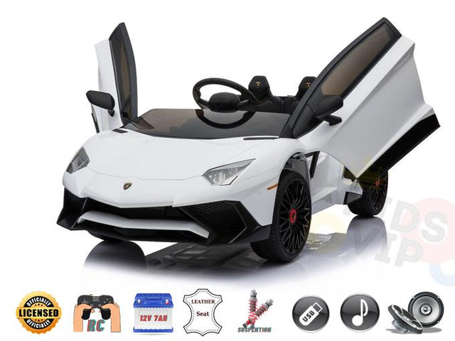 The Licensed Limited Sport Edition SV Lamborghini 12V Kids Ride-on Car comes in white, flaunting a realistic design with open scissor doors, sleek black accents, steering wheel, remote control, leather seat, USB/MP3 input, music features—making it the ultimate toy sports car for kids.