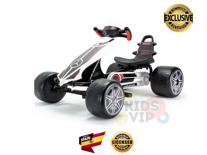 Experience the thrill of the INJUSA Officially Licensed Mercedes Pedal Go Kart for kids—a premium outdoor toy with a sleek black and white design, large wheels, a steering wheel, Kids VIP branding, badges, and a Spanish flag for added prestige.