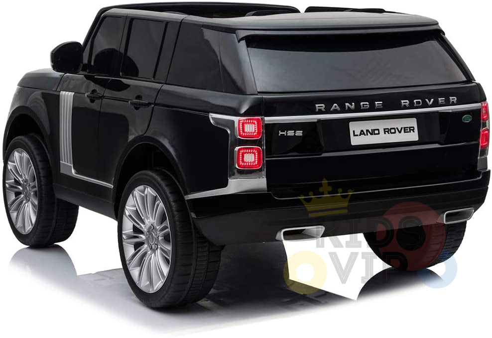 The Black 24V Official Range Rover Complete MP4 Edition Kids Ride On Car showcases chrome accents, large wheels, and tail lights. Observed from the rear and side, it features RANGE ROVER and LAND ROVER logos, perfect for little adventurers.