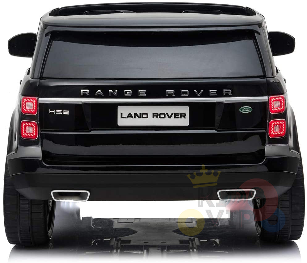 Rear view of the Black 24V Official Range Rover Complete MP4 Edition Kids Ride On Car, featuring tinted windows, HSE, and LAND ROVER branding. The toy includes upgraded taillights and exhausts, set against a white background.