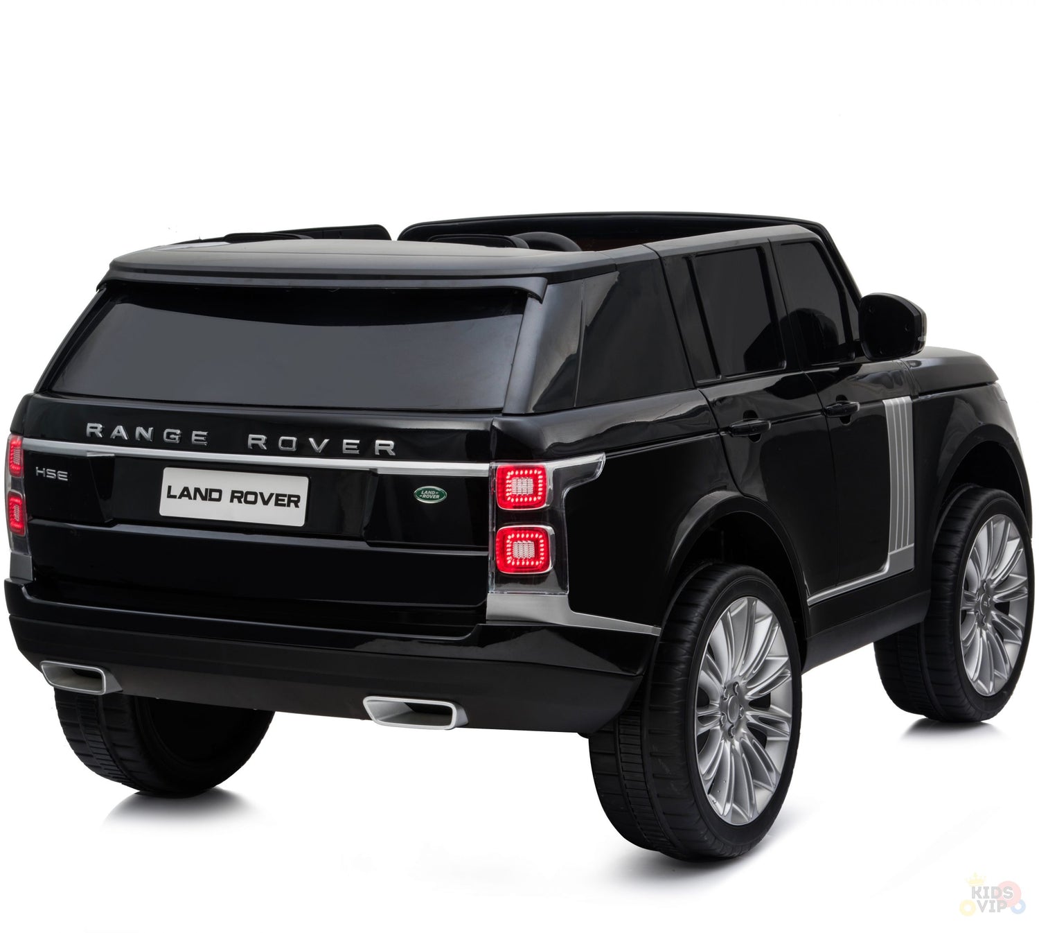 The Black 24V Official Range Rover Complete MP4 Edition Kids Ride On Car with RC is displayed from the rear, highlighting upgraded features like detailed taillights, large silver rims, and Range Rover and Land Rover branding on the trunk. Remote control adds extra fun.