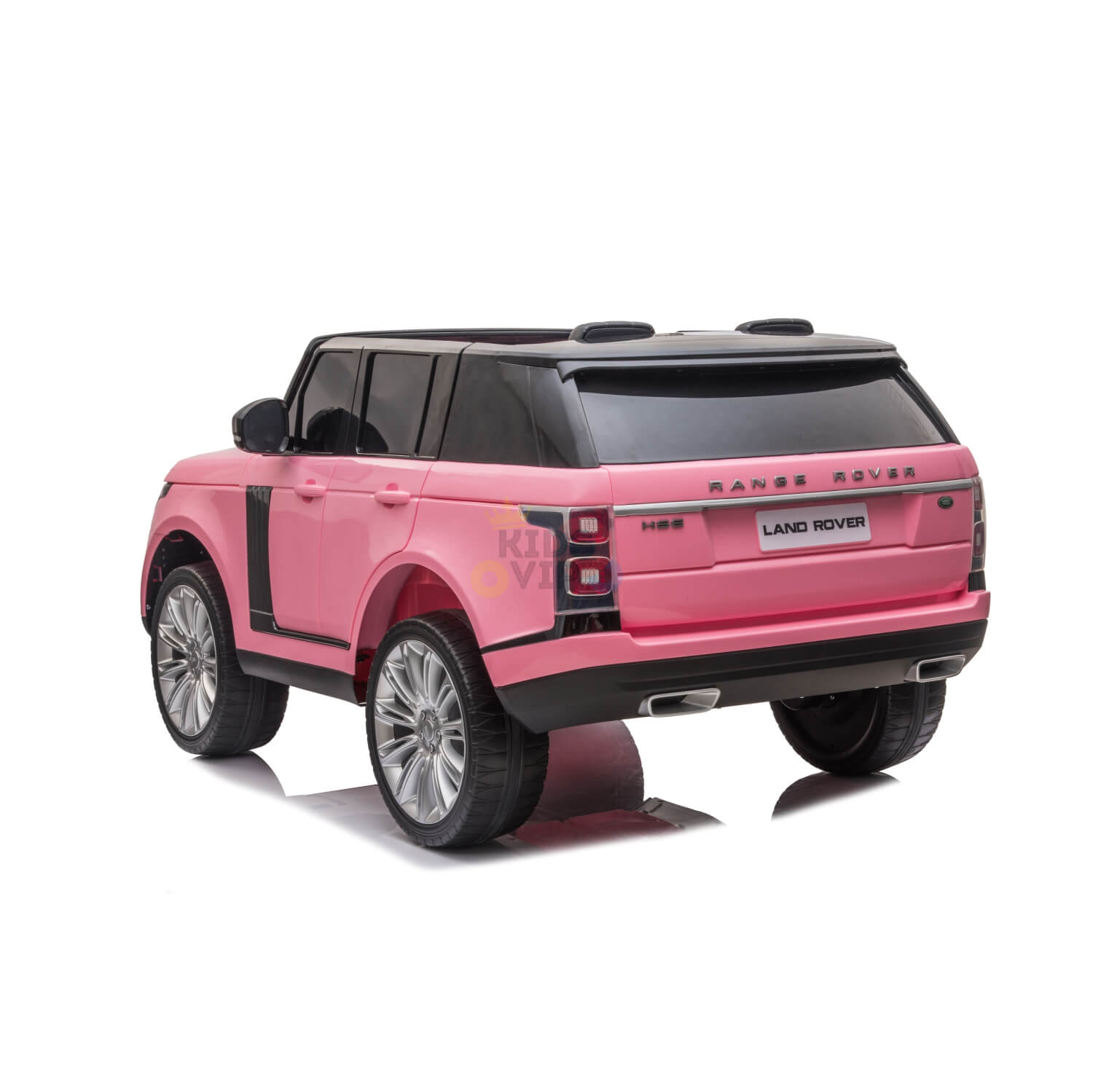 The Pink 24V Official Range Rover Complete MP4 Edition Kids Ride On Car with RC features realistic rear details like large silver wheels, a black roof, and visible badges, elegantly displayed on a white surface.