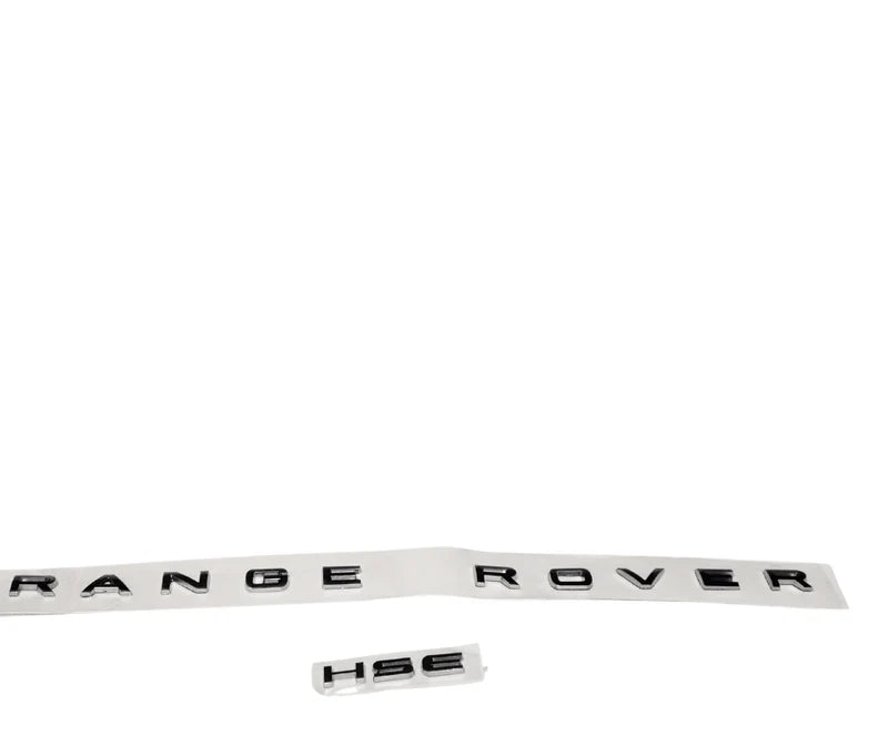 Range Rover HSE emblem on a white background

