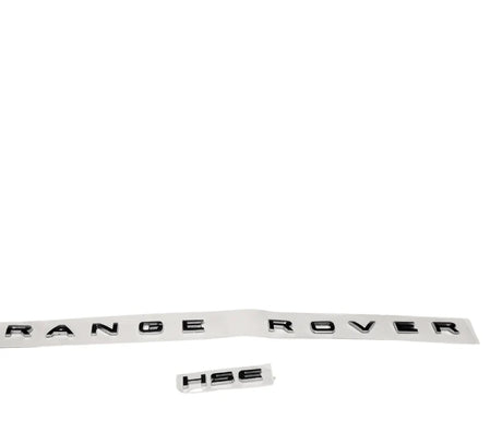 Range Rover HSE emblem on a white background

