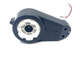 The 12V Audi R8 Drive Motor is a black plastic component with a central white circle, visible gears, and is perfect for Audi 12V gearboxes. It has three holes on one side and attached red and black wires for enhanced performance. The image is set against a plain white background.