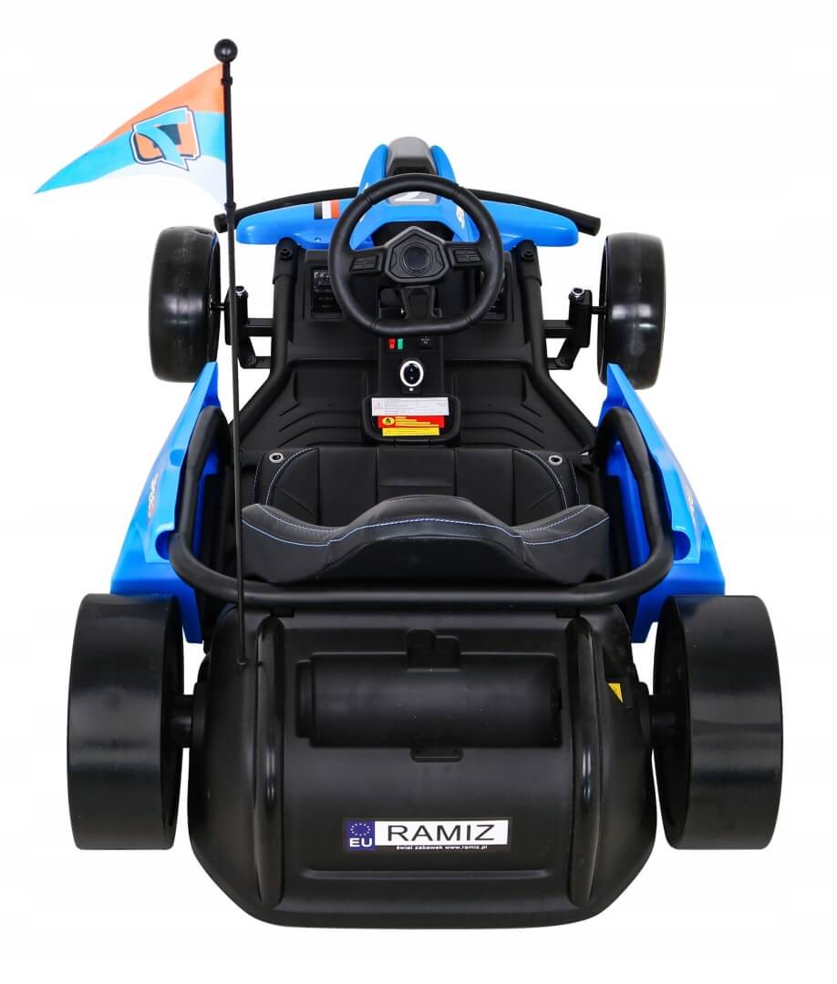 The Blue Big Kids 24 Volt Ultra-Violent Complete Edition Drifting Go-Kart resembles a race car with EVA-rubber wheels, featuring a black seat and steering wheel, plus an orange and blue flag with the RAMIZ logo on the rear, perfect for high-speed drifting fun.