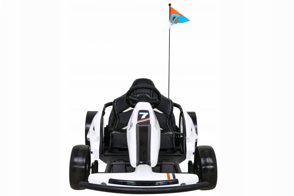 Front view of the Big Kids 24 Volt Ultra-Violent Edition Drifting Go-Kart in white with black accents, number 7 on the front, orange and blue flag on a small pole, black seat, and four visible wheels for smooth maneuverability.