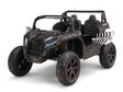 Introducing the Black 24V/180W XXL Big Kids Blade XR Ride on Buggy, a black and white toy with ECO leather seats, LED headlights, large rugged wheels, roll cage design, RACING printed on the side, and inflatable rubber tires for an authentic off-road experience.