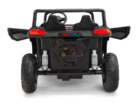 The Black 24V/180W XXL Big Kids Blade XR Ride on Buggy features a rear view with two ECO Leather Seats, open doors, and an impressive steering wheel. It has large inflatable rubber tires and showcases the Trekcar brand on the back.