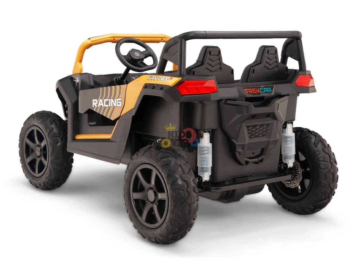 The Gold 2 Seater XXL Blade XR Edition, a 24V 180W battery-powered Ride On Buggy UTV, is styled as a rugged off-road vehicle with two seats, large tires, and a roll cage. It comes in black with yellow sporty decals and is branded Racing and Trek Car for thrilling adventures.