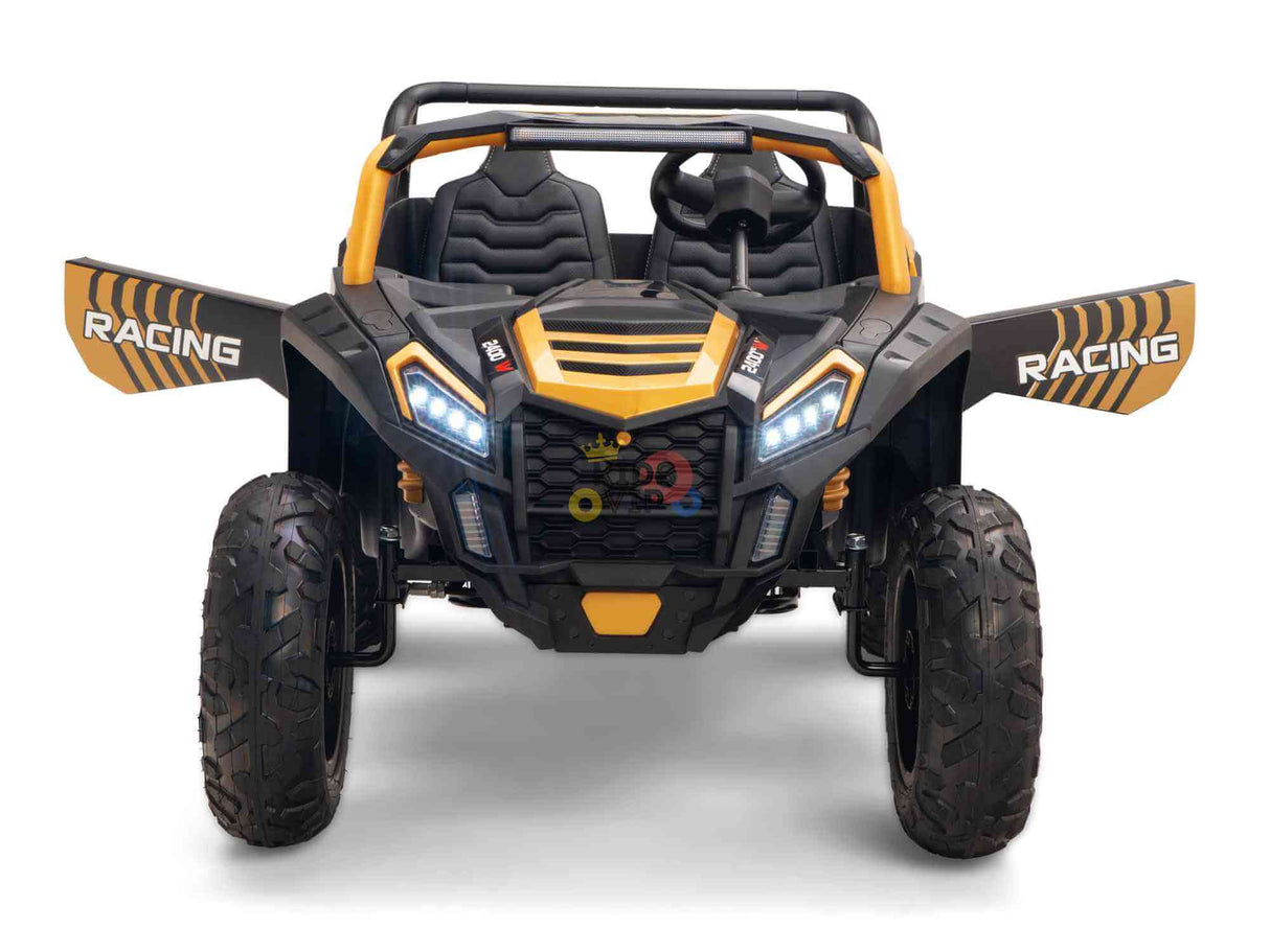 The Gold 2 Seater XXL Blade XR Edition Ride On Buggy, a 24V 180W powerhouse, features large tires, a black and yellow body with bold RACING decals, sports steering wheel, detailed headlights, and a rugged front bumper for an action-packed racing experience.