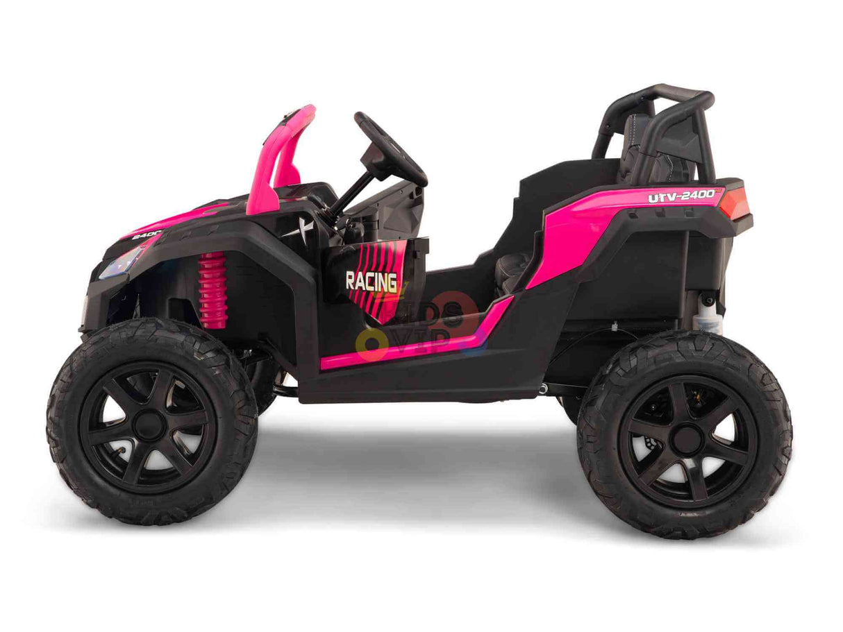 The Big Kids 24V/180W Blade XR Pink Edition Ride-on Buggy, shown from the side with a white backdrop, features oversized tires and an off-road design. Labeled XXL Blade XR Edition, it displays UTV-2400 and Racing on the sides, along with enhanced inflatable rubber tires for better traction.