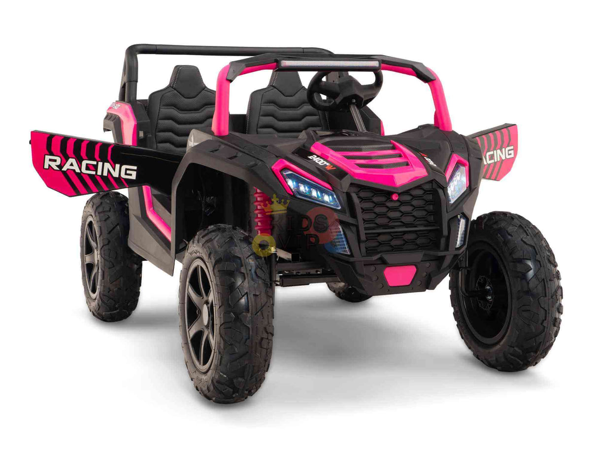 Check out the Big Kids 24V/180W Blade XR Pink Edition Ride on Buggy. This pink and black ride features real inflatable rubber tires, large wheels, and RACING on the side wings. With two seats, a steering wheel, and a rugged front grille, its perfect for young racing enthusiasts.