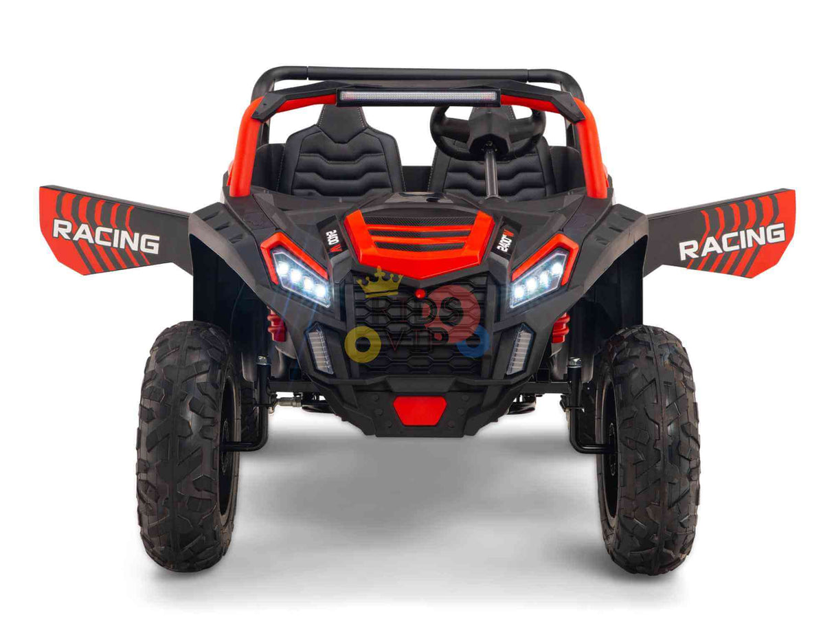 Front view of the Big Kids 24V/180W Blade XR Red Edition Ride on Buggy. It mimics an off-road vehicle with ECO Leather Seats, a red and black color scheme, rugged tires, and RACING on the sides, providing a sporty look with realistic details.