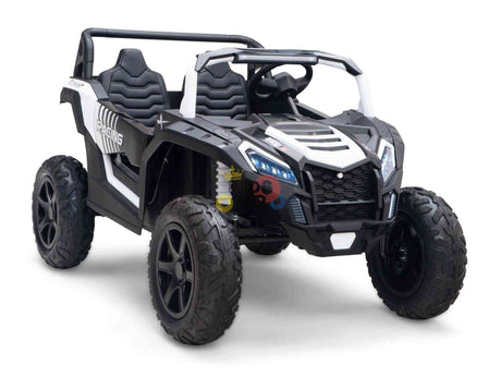 The White 24V/180W XXL Big Kids Blade XR Ride On Buggy boasts a black and white design with large inflatable tires, roll cage, and two seats. Its angular body panels and front bumper mirror the dynamic style of the XXL Blade XR Edition.
