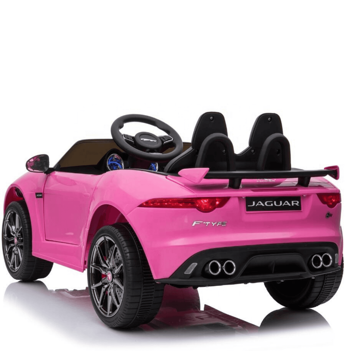 The Pink 12V Official Jaguar F-Type Complete Edition Kids Ride on Car impresses with its shiny exterior and sporty design. It comes with black leather seats, a steering wheel, dual exhausts, branded logos, and a parental remote control for enhanced safety and fun.