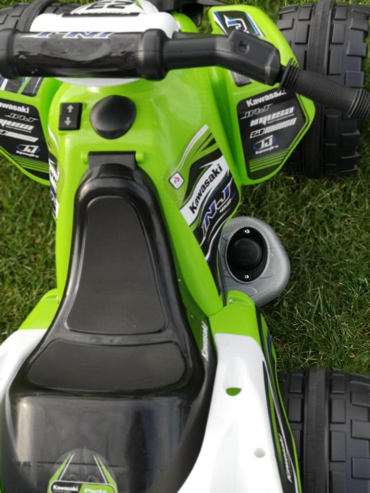 Green INJUSA Official 12V Kawasaki Ride On Quad/ATV for Kids