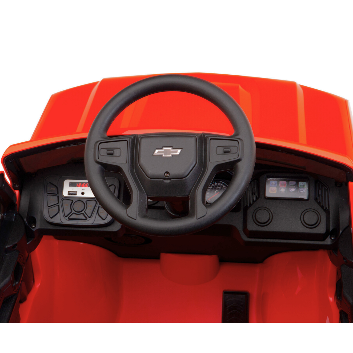 The image shows the interior of the Red 12V Chevrolet Silverado Kids Licensed 1 Seater Ride On Truck, featuring a black steering wheel with logo, red dashboard, gear lever, and realistic buttons—offering little adventurers an authentic driving experience.