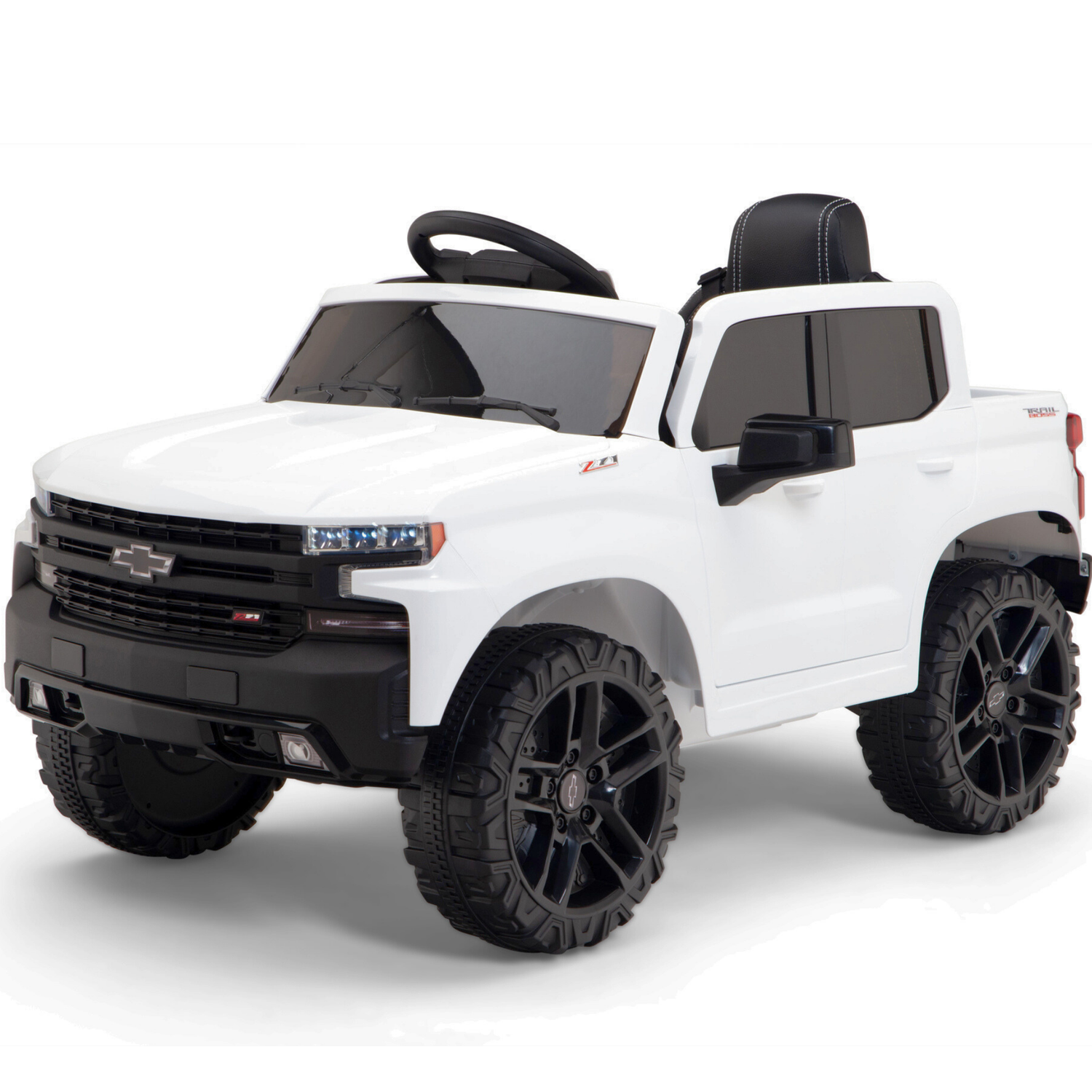 The White 12V Chevrolet Silverado Kids Licensed 1 Seater Ride-On Truck features oversized black wheels, a sleek design, a black interior with steering wheel, and the Chevrolet emblem on the grill. This stylish kids car offers remote control functionality and built-in music.